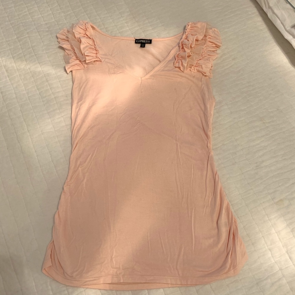 XS blush tee with ruffled shoulders